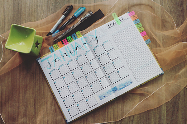 calendar day planner on table